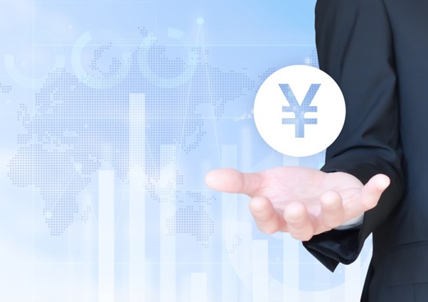 お金マークを持つビジネスマン